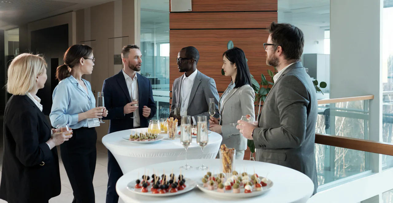 Business professionals at a corporate event in Brightspot’s source article