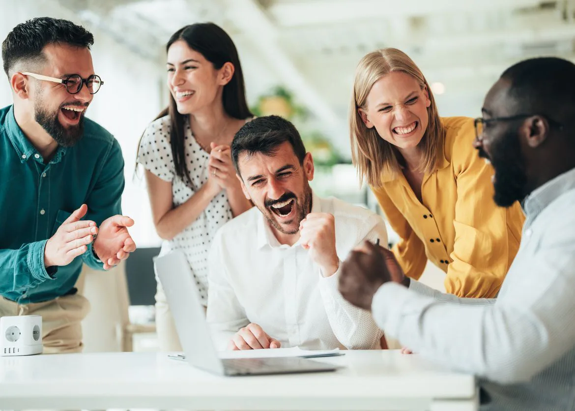 Employees pictured in Gift Card Partners’ year-end recognition article