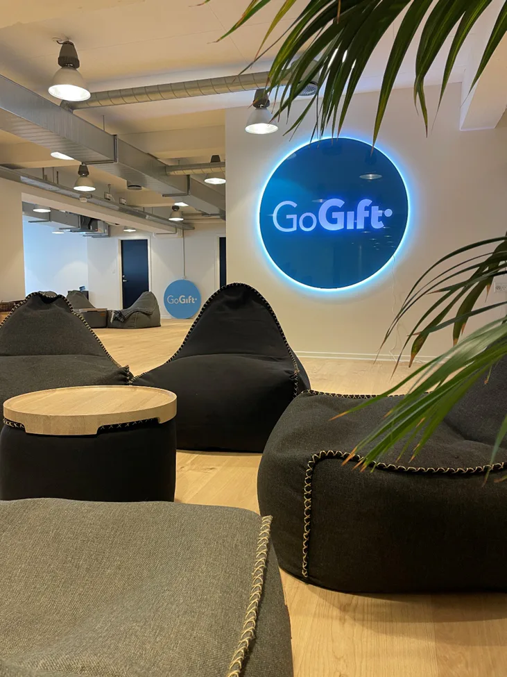 Lounge seating and the GoGift logo inside the company’s Christianshavn office