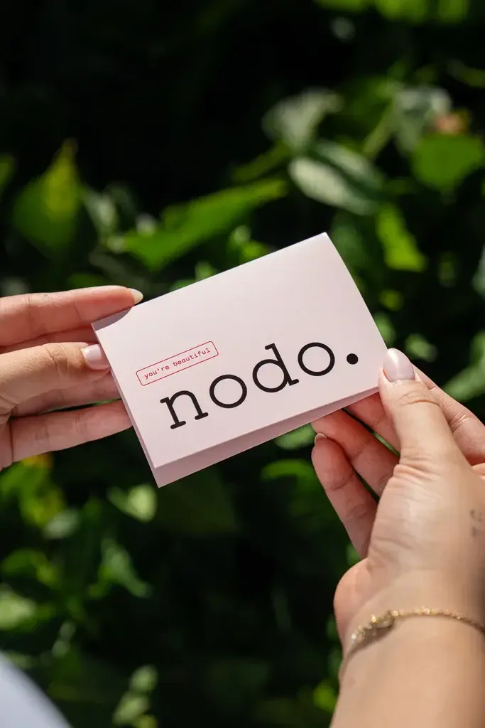 Official Nodo gift-card customer story artwork published by Wrapped